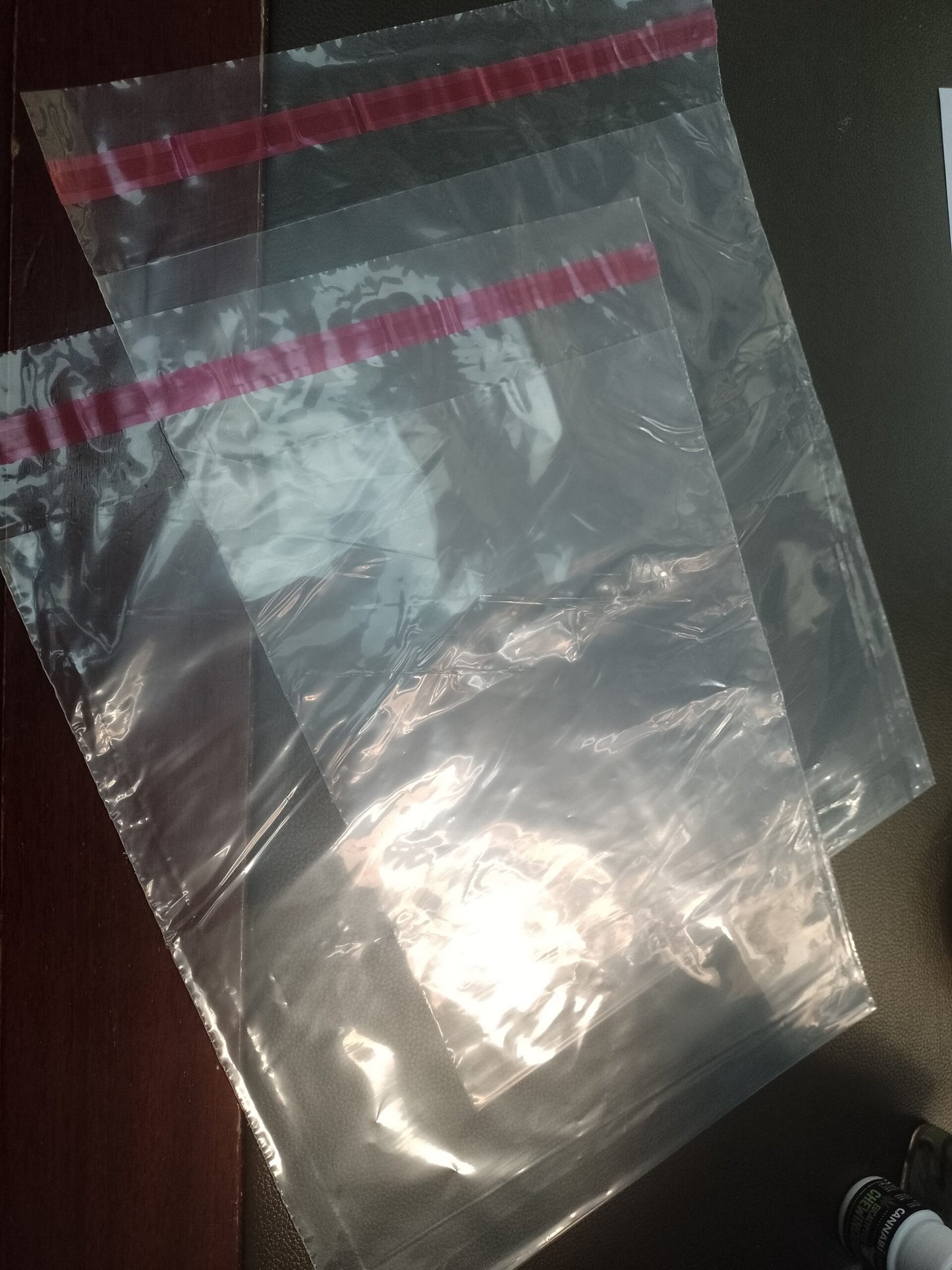100 Pcs Clear Polyethylene Bags with Adhesive Closure 25 × 35 cm
